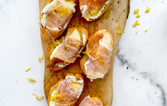 Pear + Proscuitto Crostini with Whipped Goat Cheese