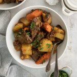 a bowl of pot roast vegetables and beef