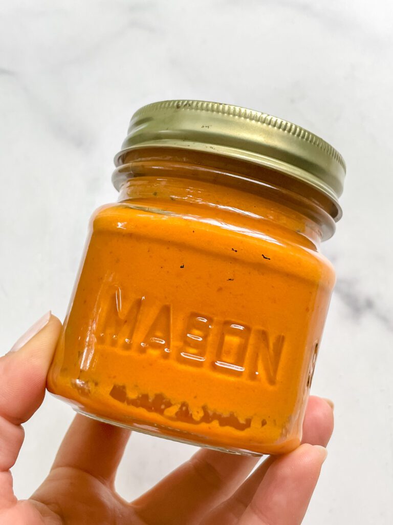 A mason jar full of delicious DIY hot sauce