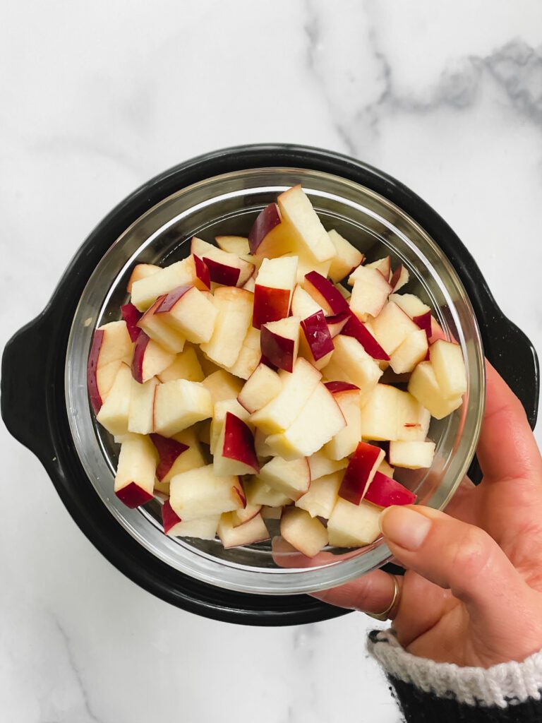 chopped-apples-for-kat-can-cooks-viral-apple-pie-slow-cooker-oatmwal-breakfast-recipe-the-perfect-back-to-school-breakfast