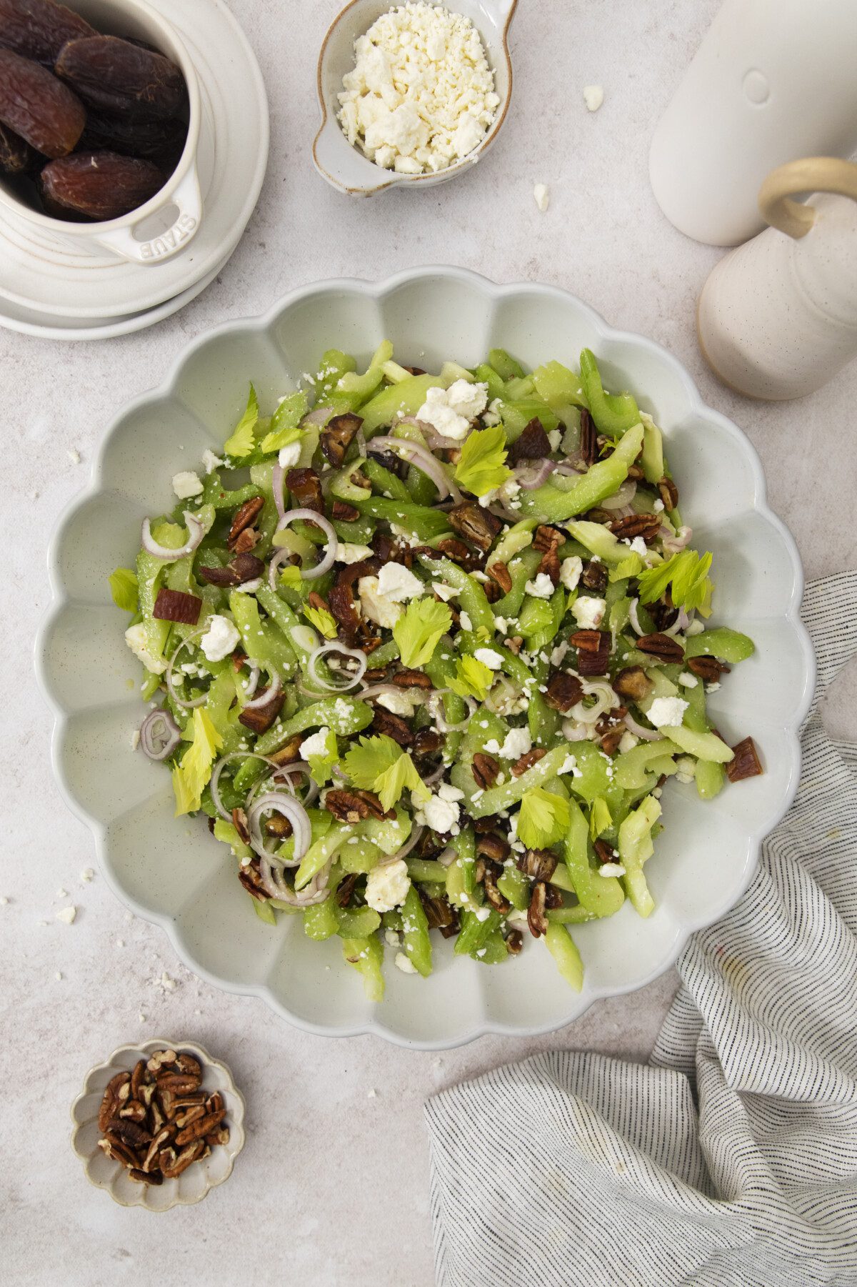 chopped celery salad in a fluted serving bowl