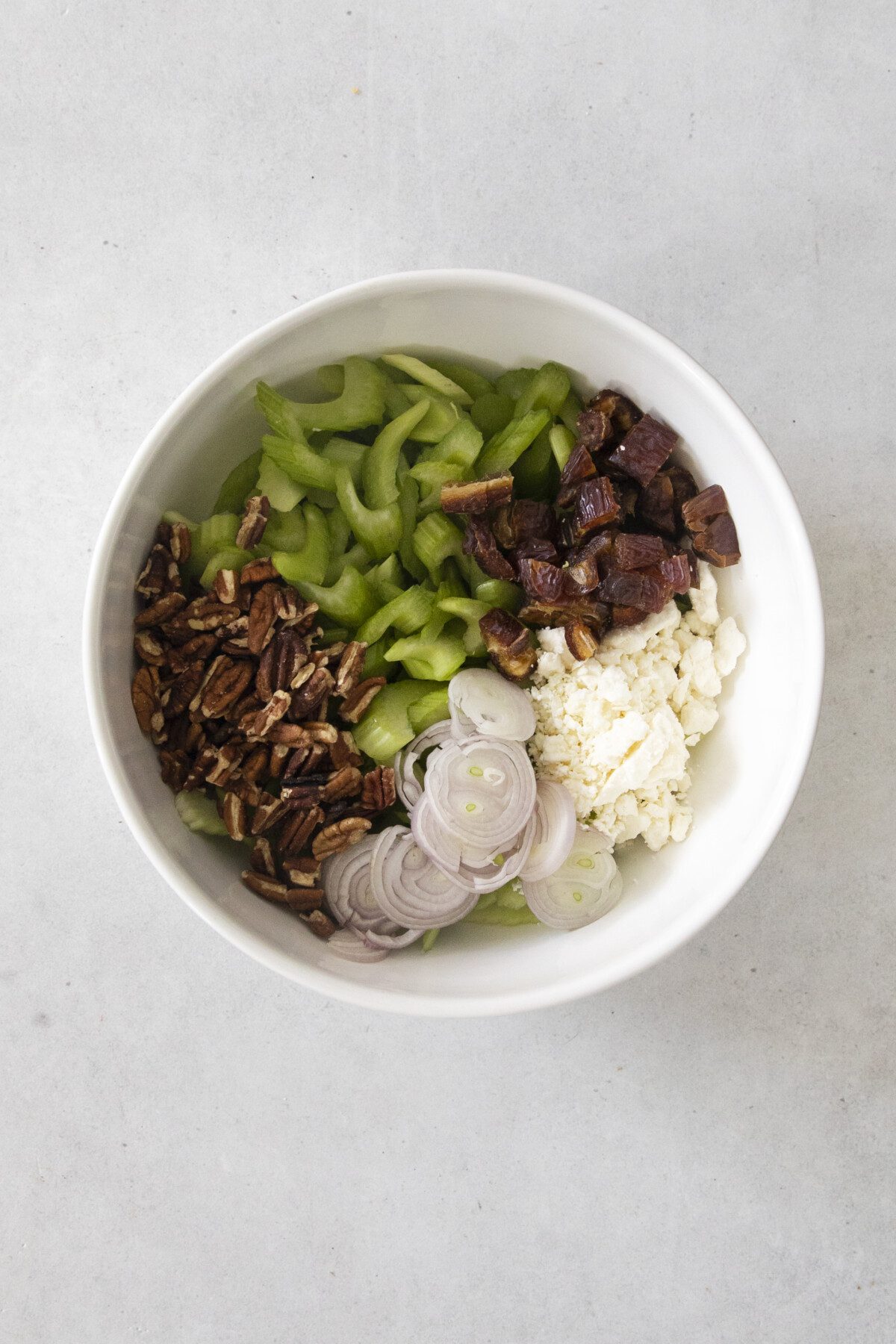 salad ingredients in a ceramic bowl