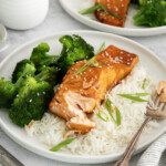 maple glazed salmon with a side of broccoli on a bed of rice