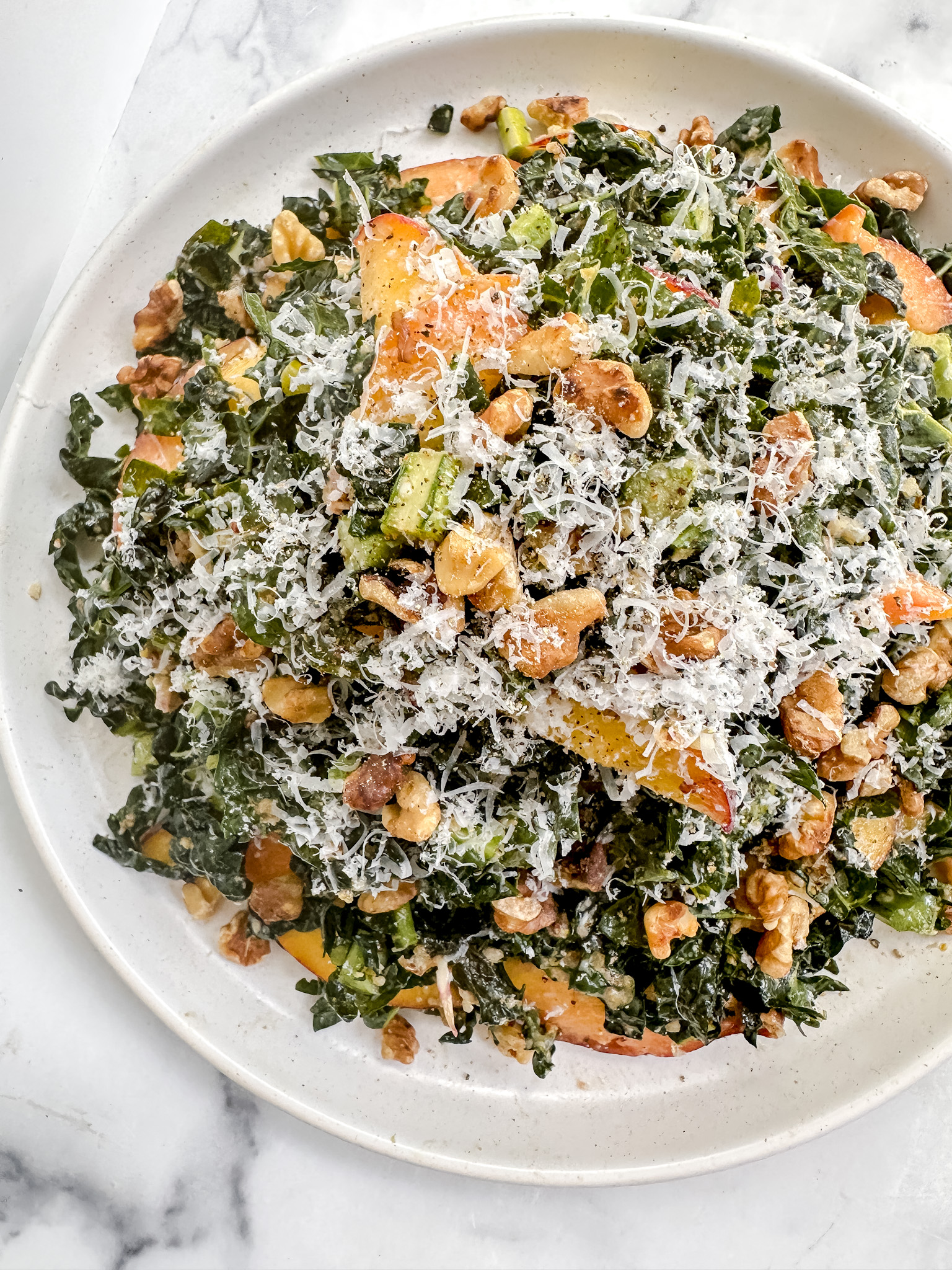 Tuscan Kale Salad with Peaches, Parmesan, and Toasted Walnut Vinaigrette
